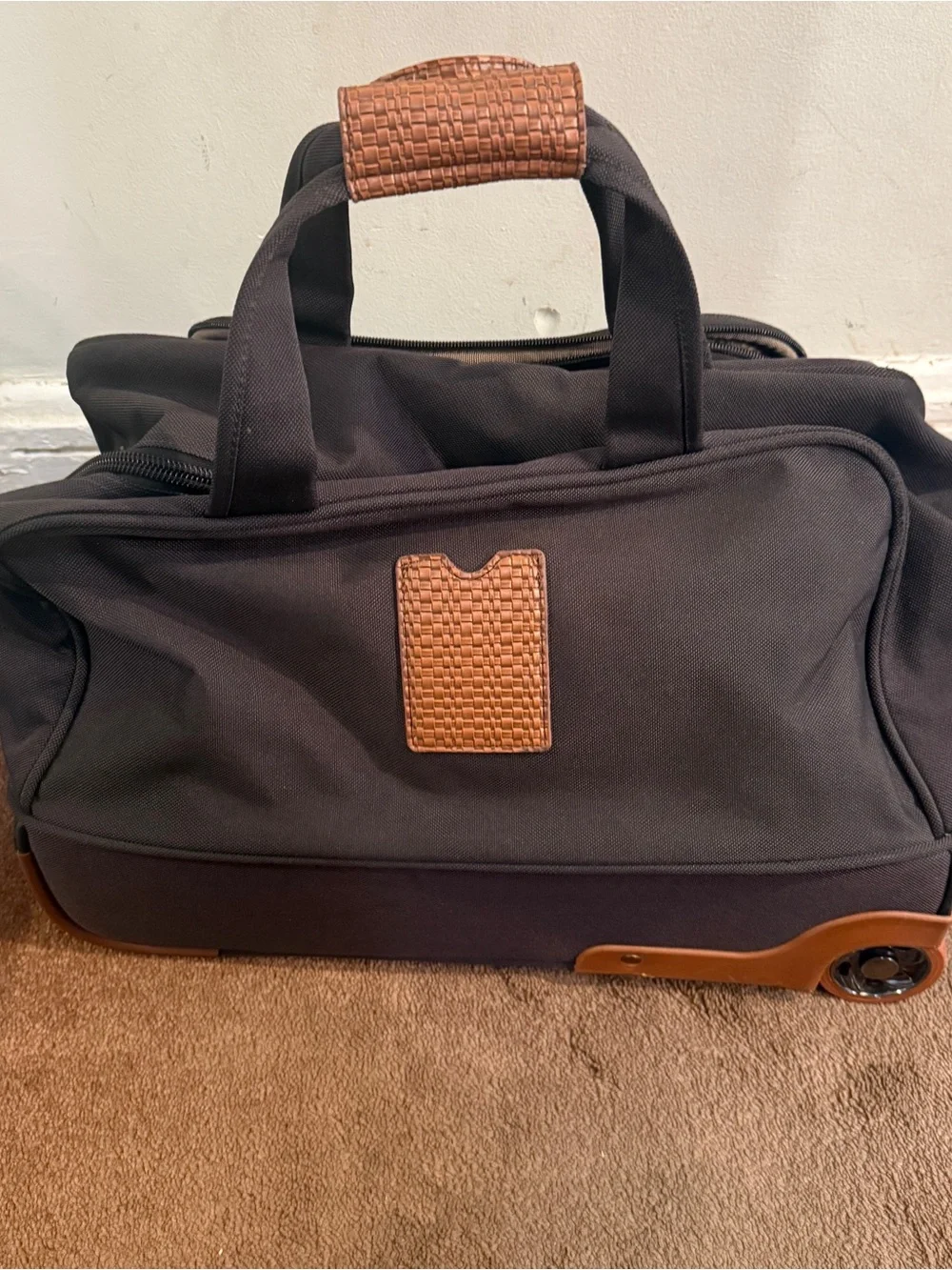 Tommy Bahama Dark Brown and Tan Rolling Travel Duffel